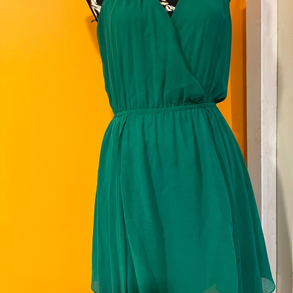 Bebe high low green dress